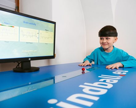 Child playing Mindball Game